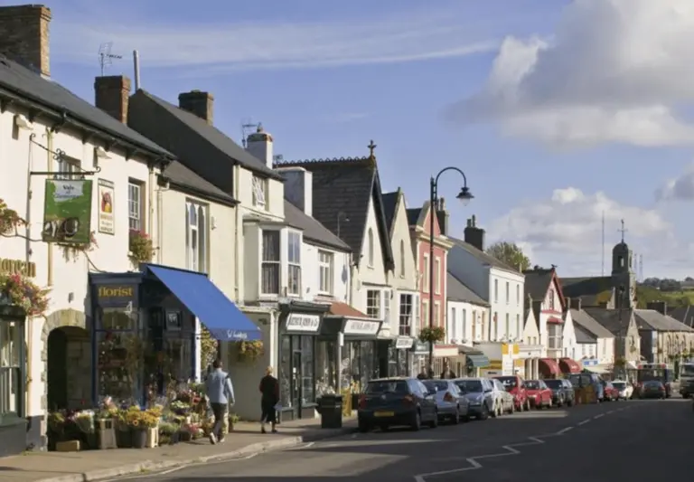 high street view in cowbridge with shops and period buildings