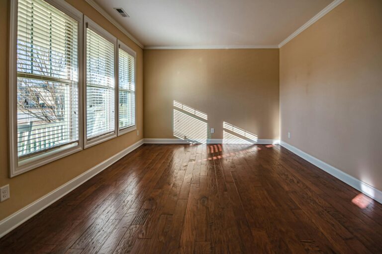 after garage conversion empty room.webp