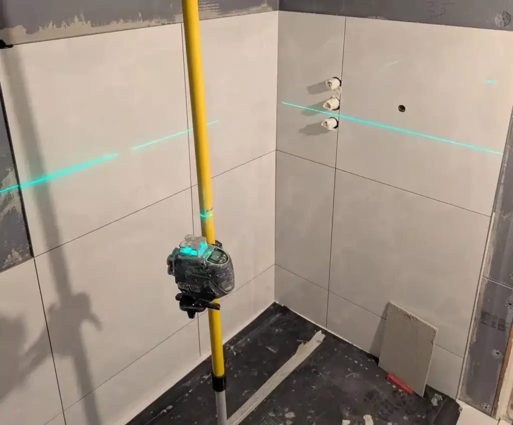 Modernising a Tired Bathroom with a Full Refurbishment in Barry 2 laser levelling before bathroom replaced barry south wales edited